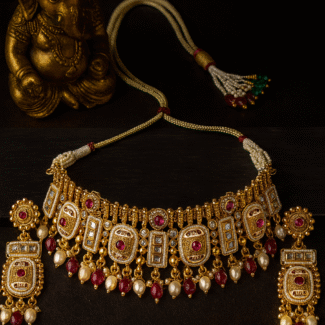 Rajwada gold plated red  stone choker set with long earrings